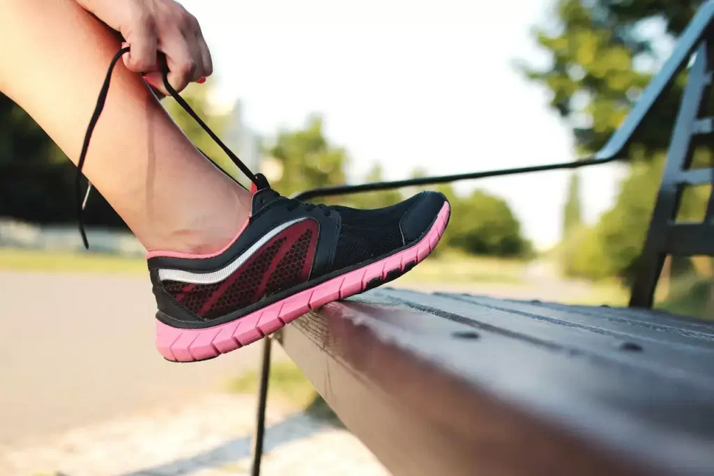 Close up of someone tying a shoe lace