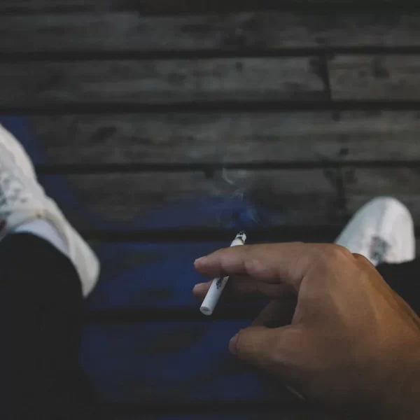 Person holding a cigarette