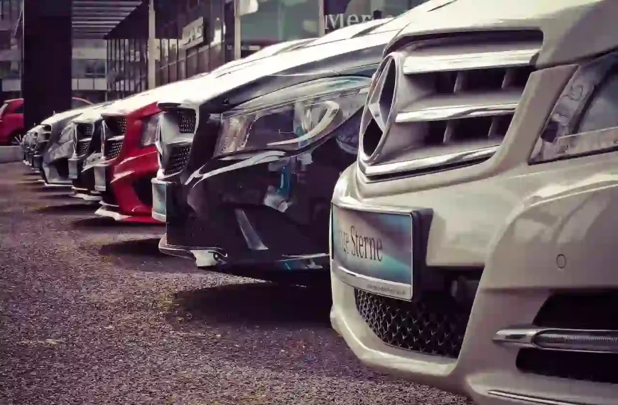 A bunch of Mercedes parked in a row