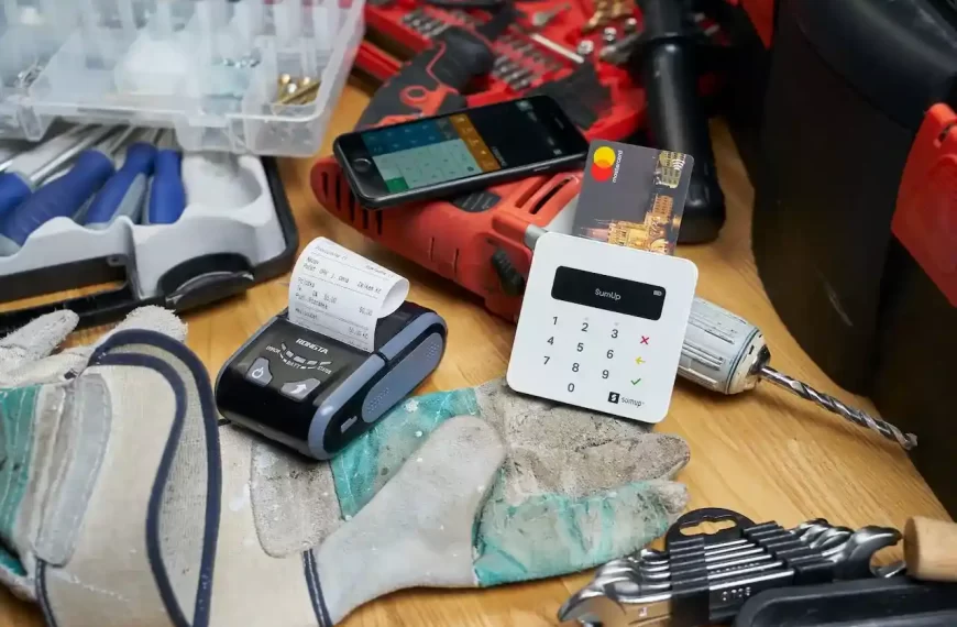 Cash register on dry gloves in a work shop environment