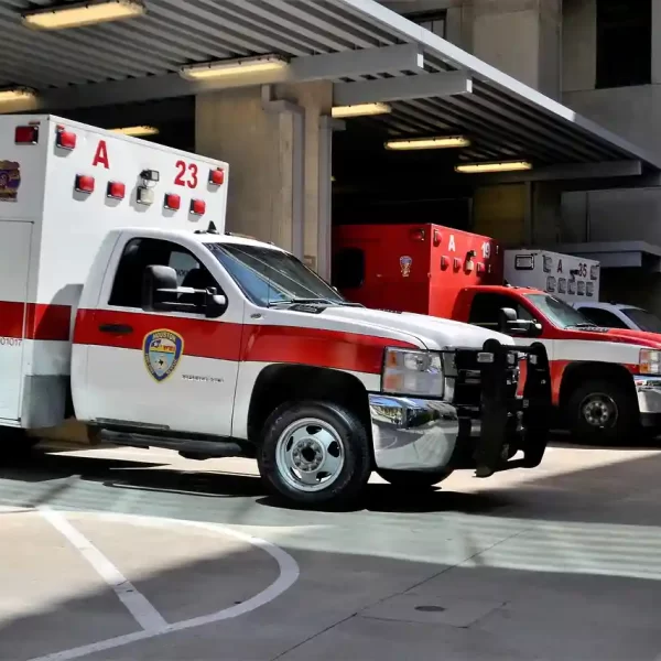 Ambulances standing in front of a emergency room