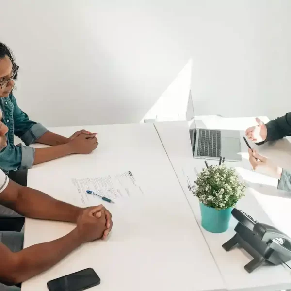 A couple sitting in front of a financial advisor